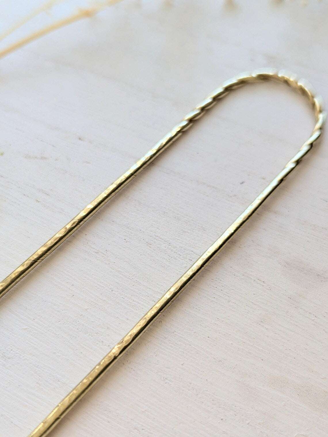 Twist & Hammered gold U pin bun holder Hair fork - close up of hammered u pin fork