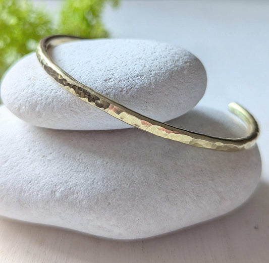open cuff hammered texture sold brass bangle, is a beautiful sunshine gold colour
