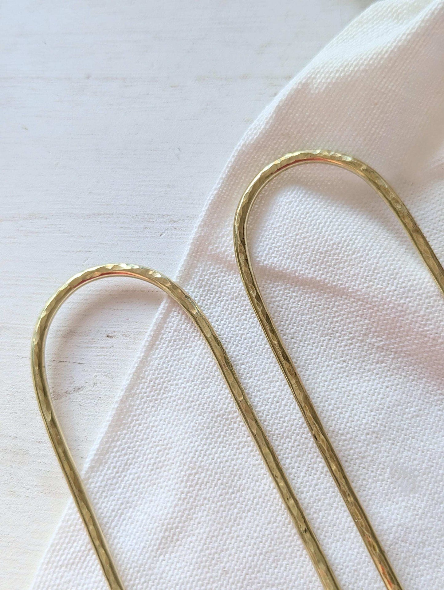 Hammered brass Gold Hair fork, minimalist hair accessory - close up of hammered textured