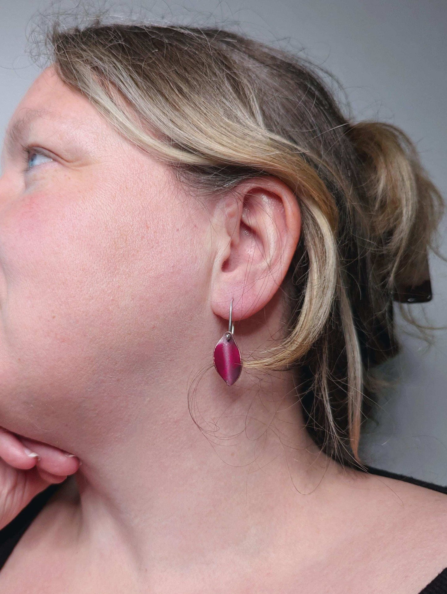 Handcrafted Autumn Leaf Dangle Earrings in Sterling Silver & Copper with a vibrant red Patina - worn on ear