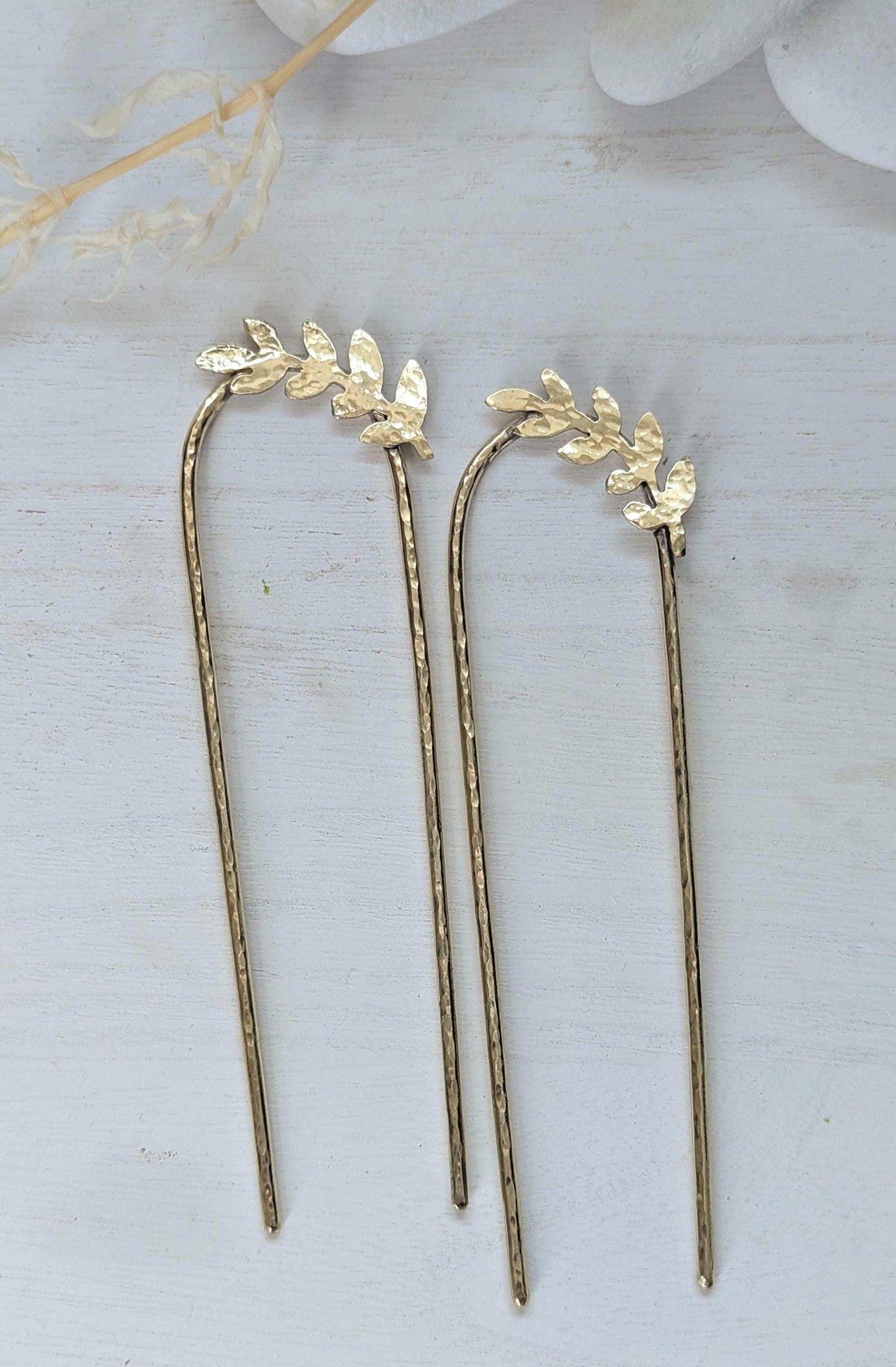 Handcrafted and forged romantic Grecian style laurel leaf rounded hair fork - hammered gold brass laurel leaf is offset to the right at the top of the hair fork