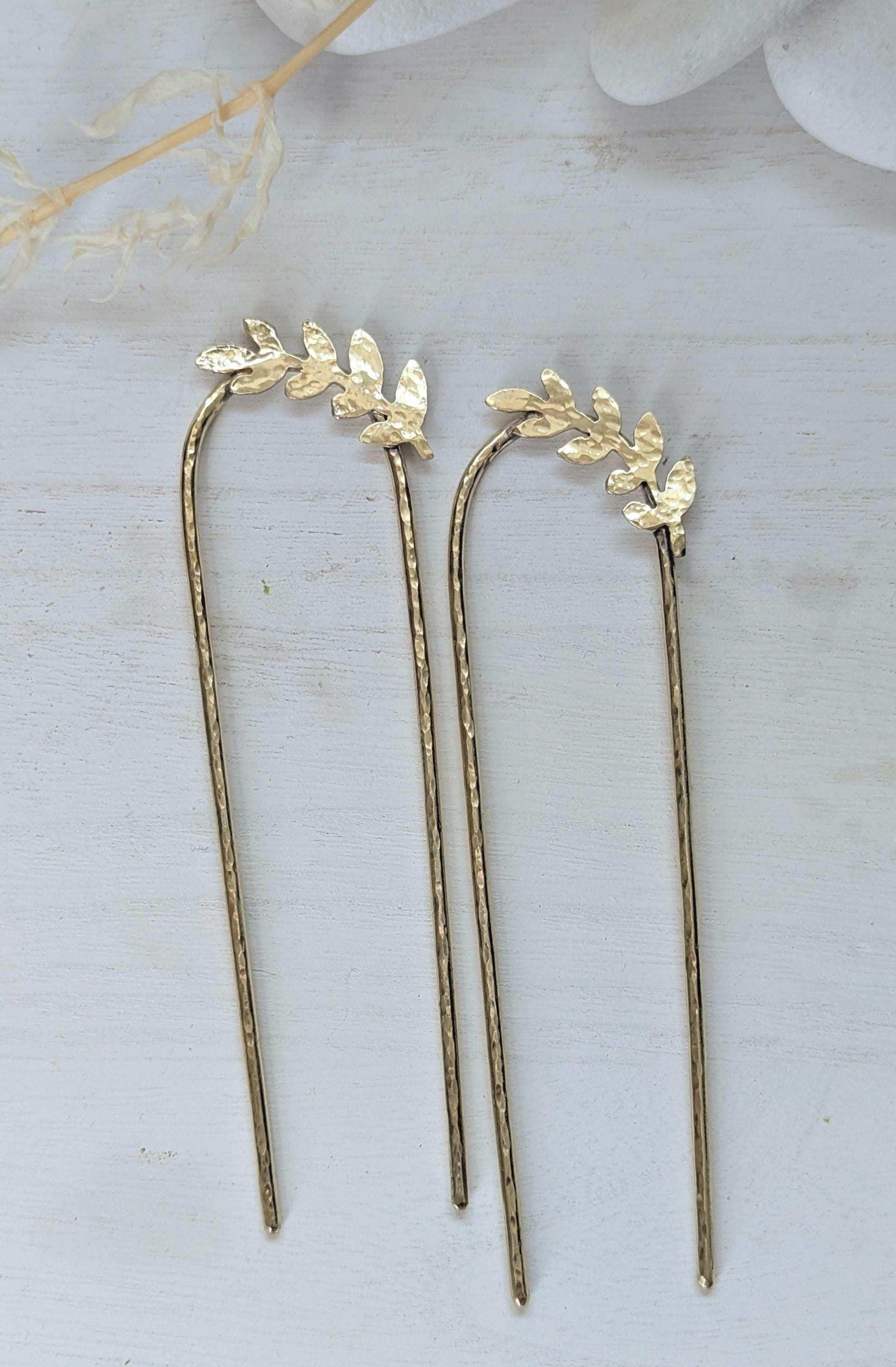 Handcrafted and forged romantic Grecian style laurel leaf rounded hair fork - hammered gold brass laurel leaf is offset to the right at the top of the hair fork