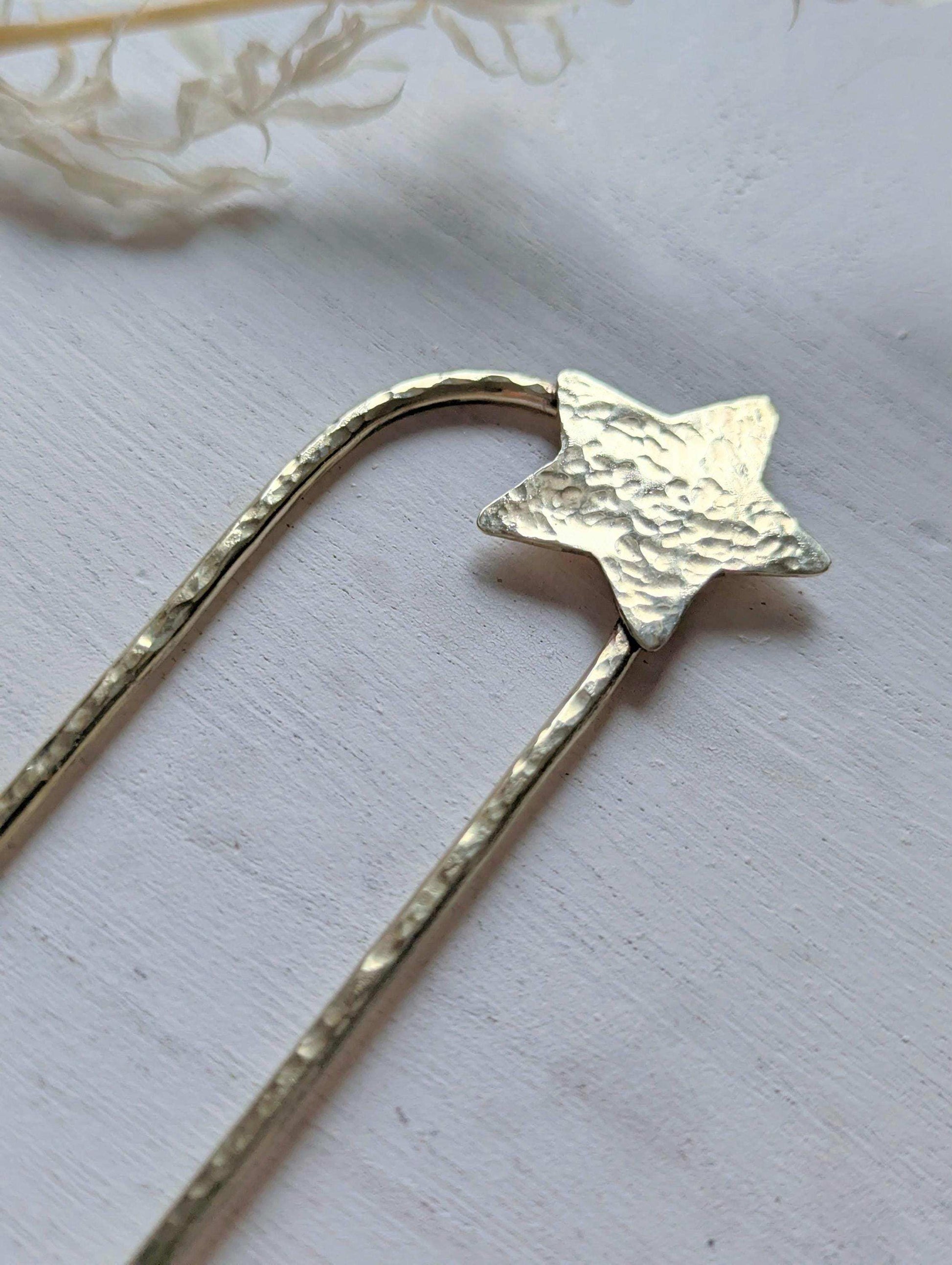 Handcrafted and forged hammered gold star rounded French pin bun hair fork - star offset to the right at the top of the hair fork