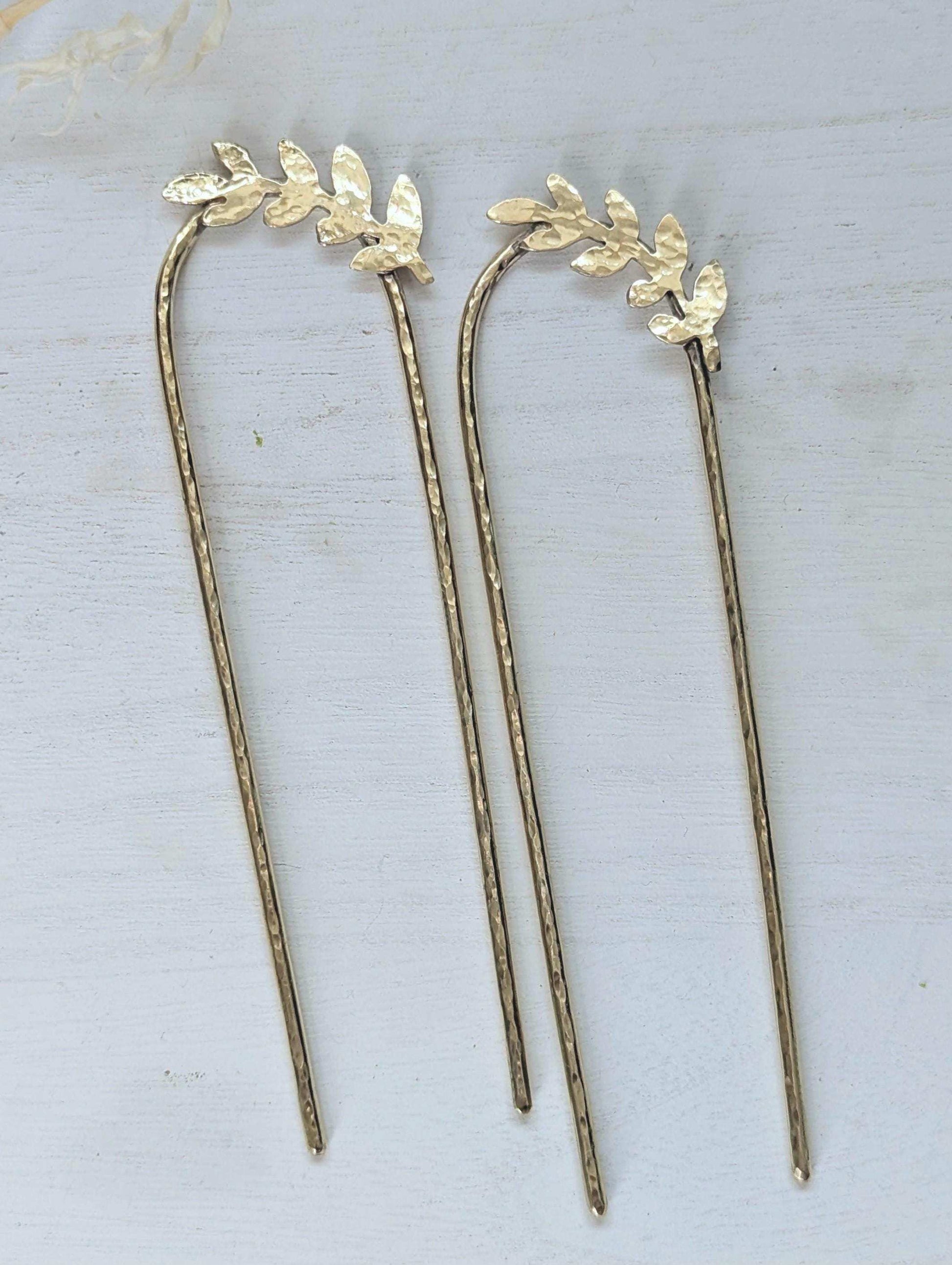 Handcrafted and forged romantic Grecian style laurel leaf rounded hair fork - hammered gold brass laurel leaf is offset to the right at the top of the hair fork