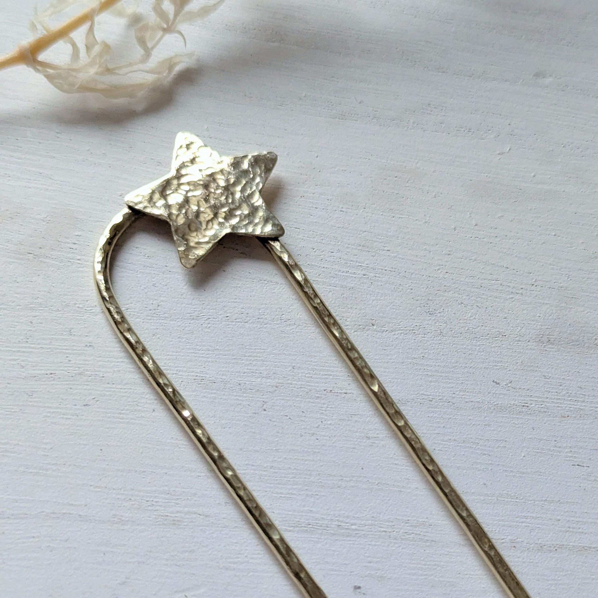 Handcrafted and forged hammered gold star rounded French pin bun hair fork - star offset to the right at the top of the hair fork