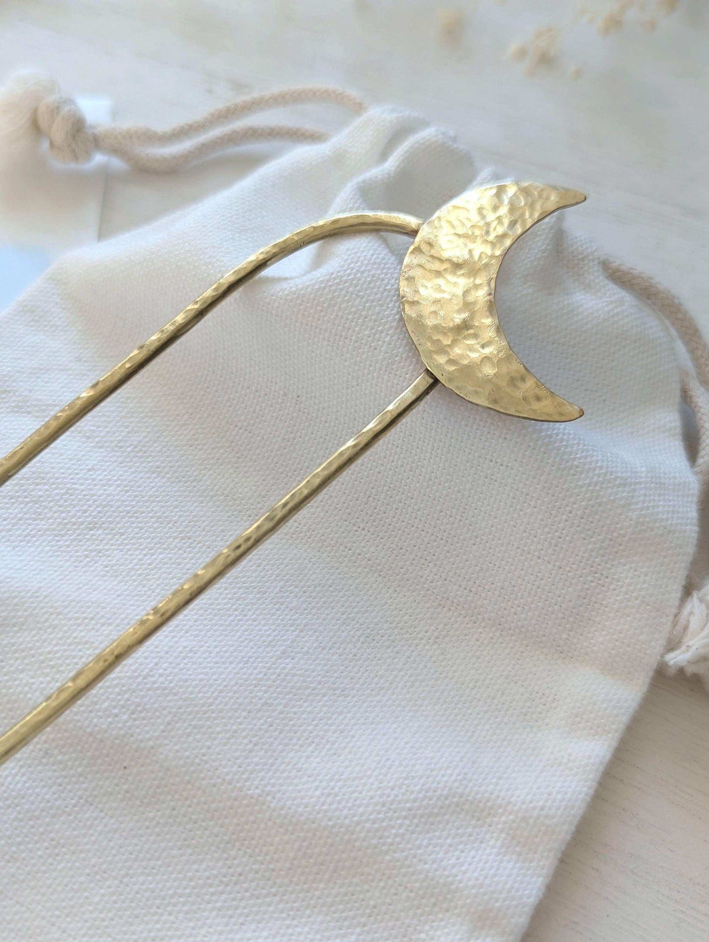 Gold Moon U Pin French bun hair fork - hammered brass moon is offset to the top right of the hair fork