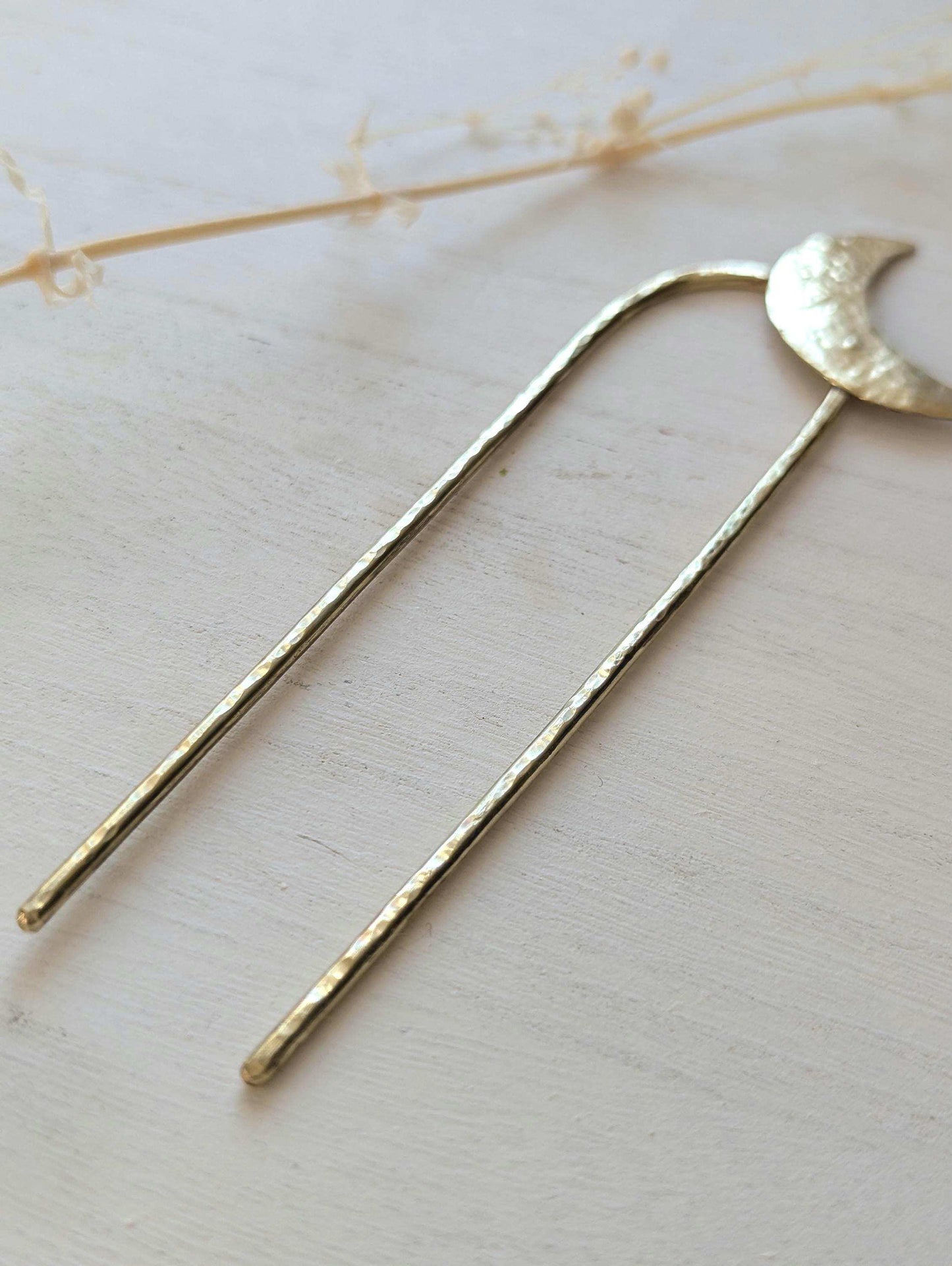 Gold Moon U Pin French bun hair fork - hammered brass moon is offset to the top right of the hair fork
