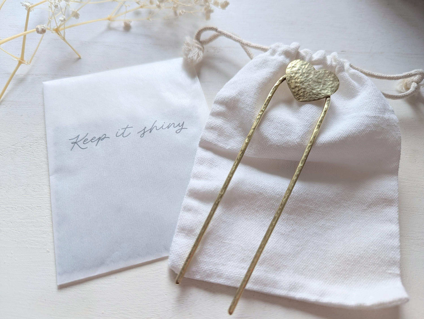Gold hammered Heart U Pin French bun Hair Fork - shown with cotton bag and polishing cloths