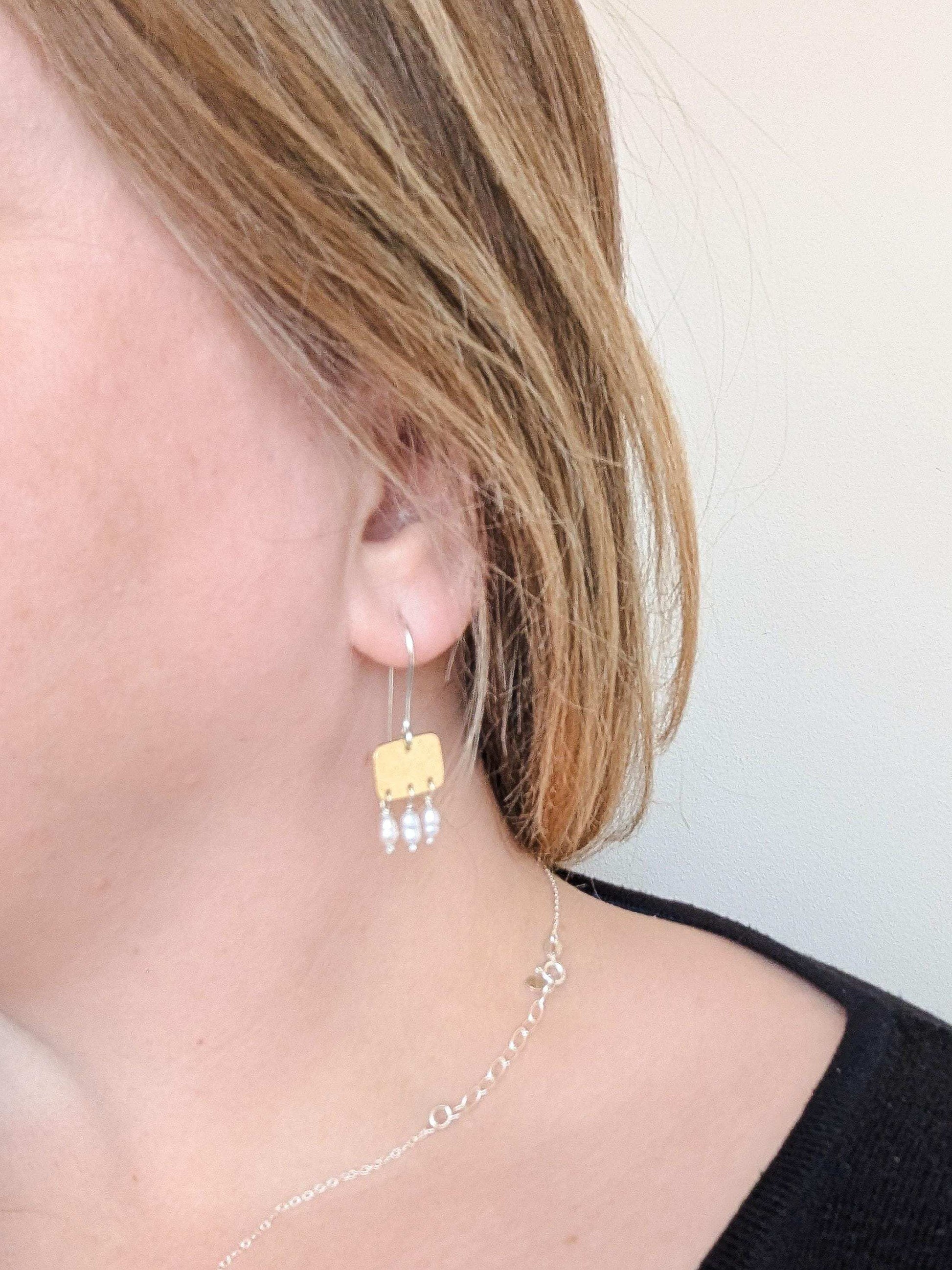 Roman style hammered brass gold squares with 3 seed pearl droplets hanging from each square | 925 Sterling Silver ear wires - mixed metals - shown worn of ear lobe