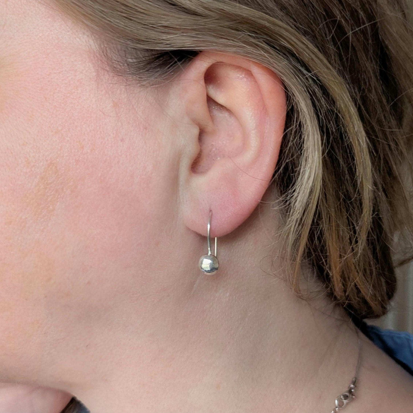 Dainty handcrafted 925 sterling silver pebble drop earrings with a hammered texture