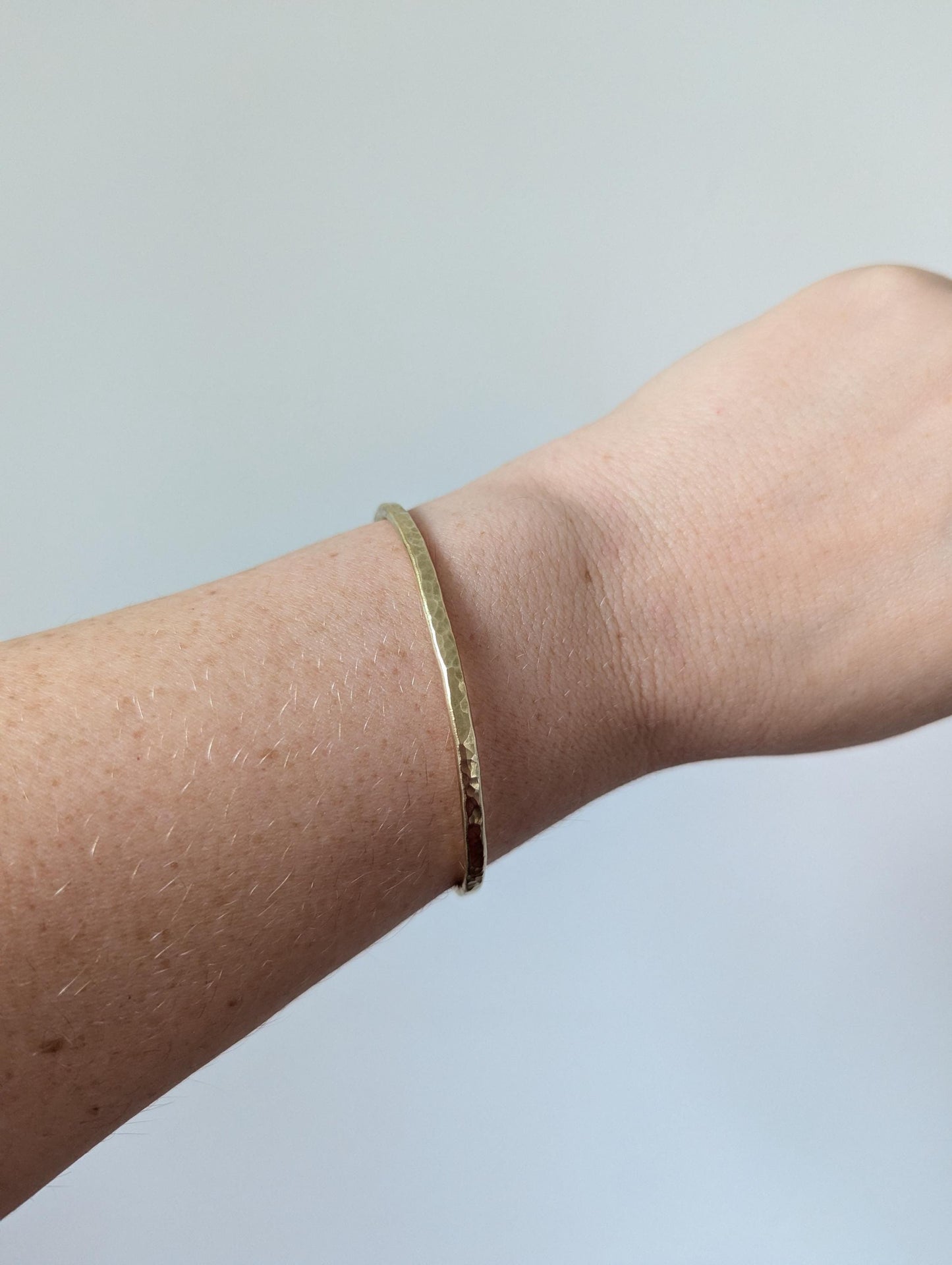 open cuff hammered texture sold brass bangle, is a beautiful sunshine gold colour