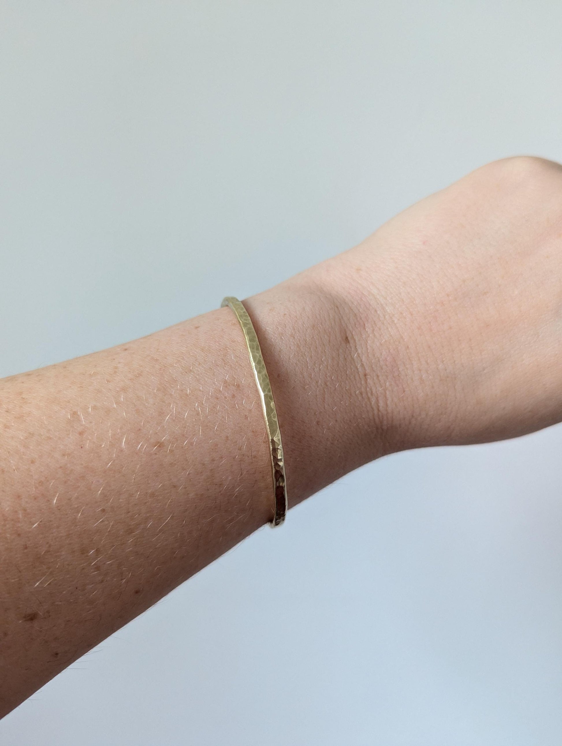 open cuff hammered texture sold brass bangle, is a beautiful sunshine gold colour