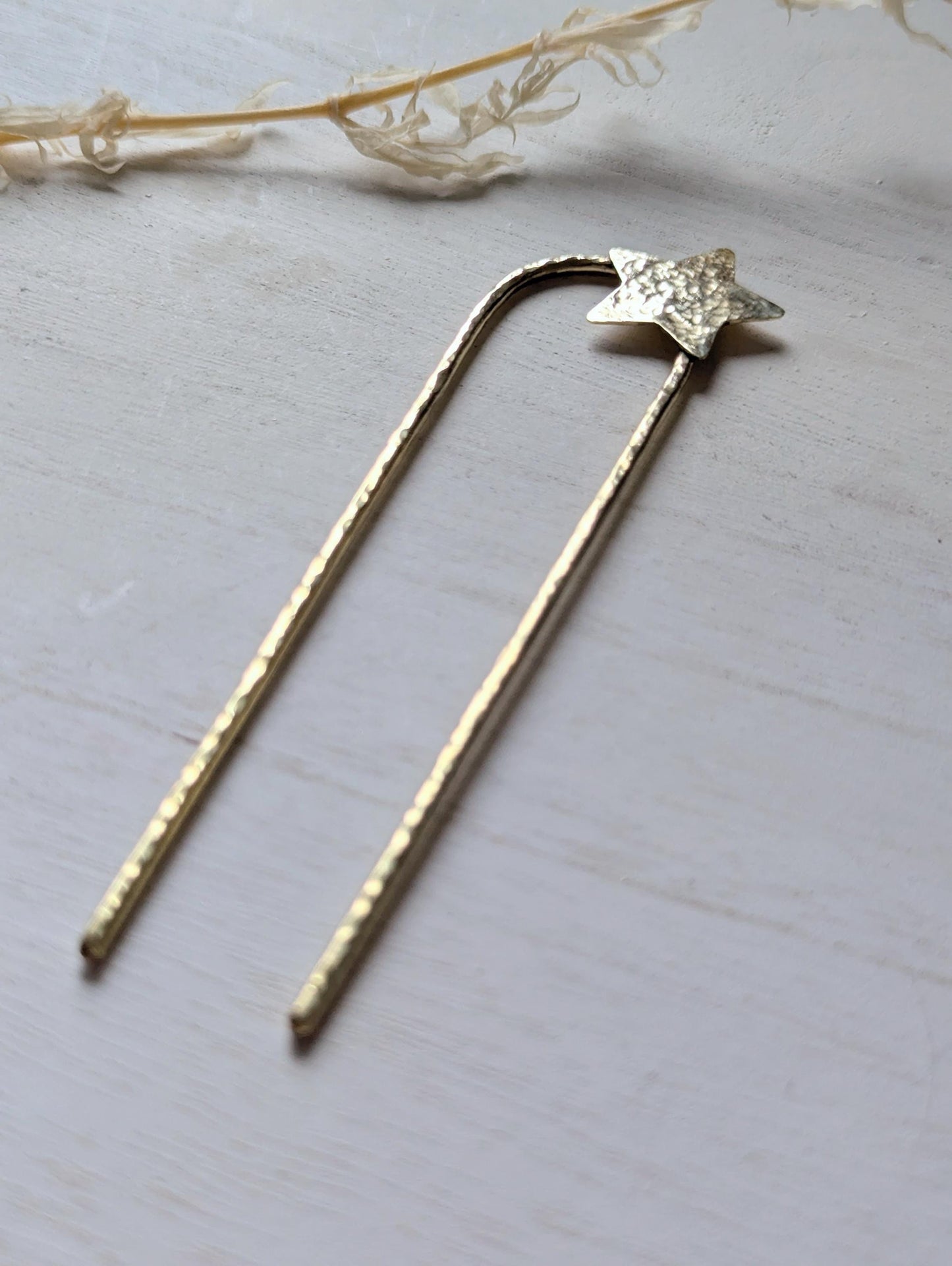 Handcrafted and forged hammered gold star rounded French pin bun hair fork - star offset to the right at the top of the hair fork