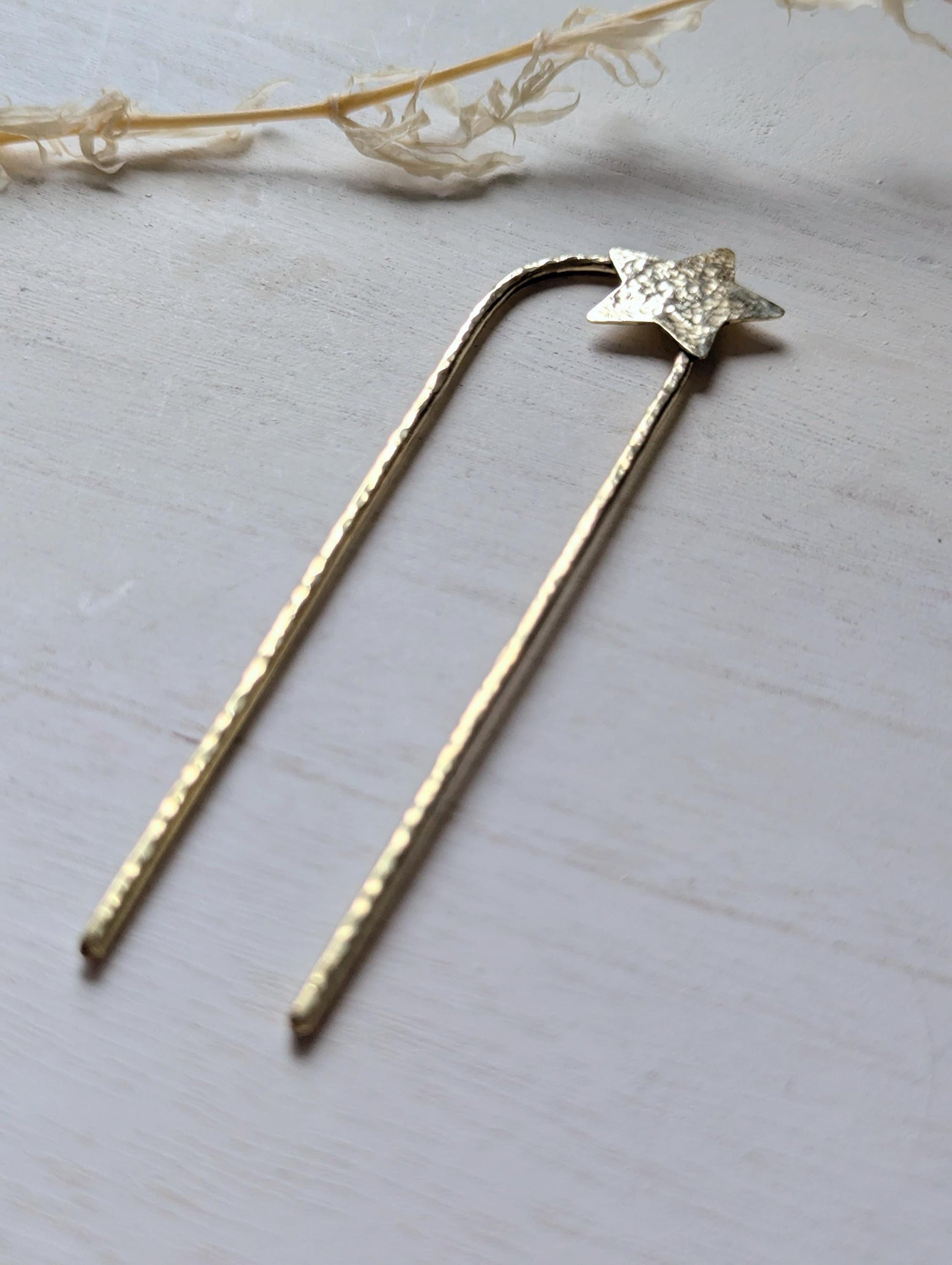 Handcrafted and forged hammered gold star rounded French pin bun hair fork - star offset to the right at the top of the hair fork