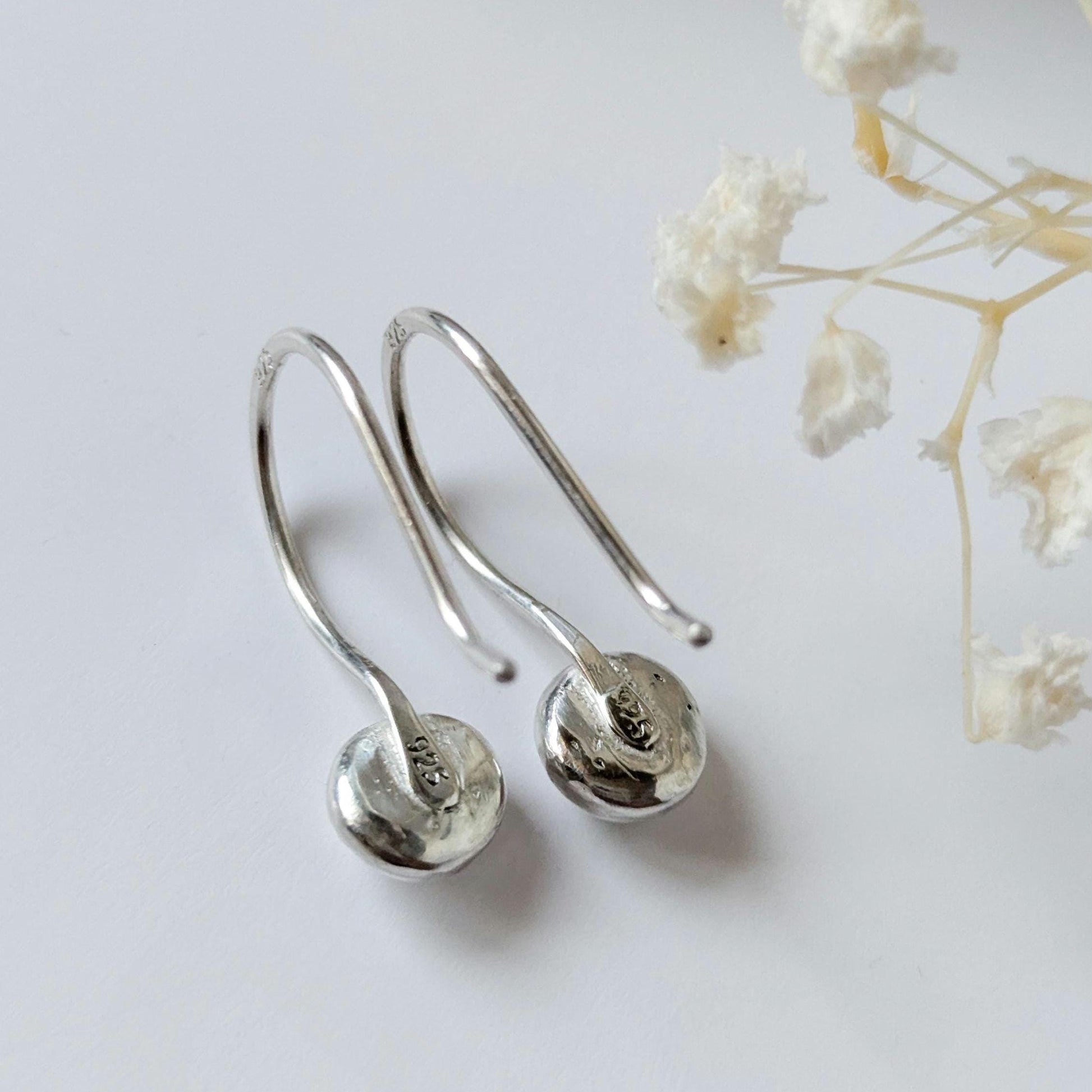 Dainty handcrafted 925 sterling silver pebble drop earrings with a hammered texture