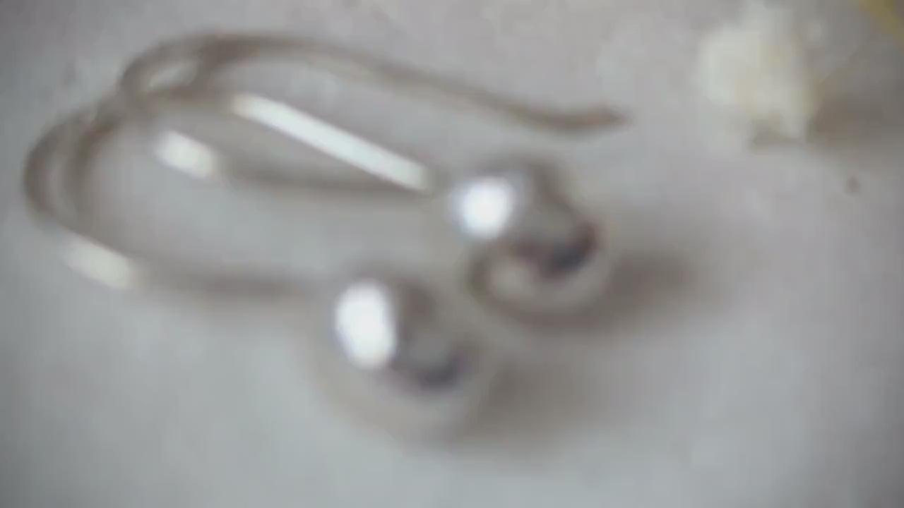 Dainty handcrafted 925 sterling silver pebble drop earrings with a hammered texture