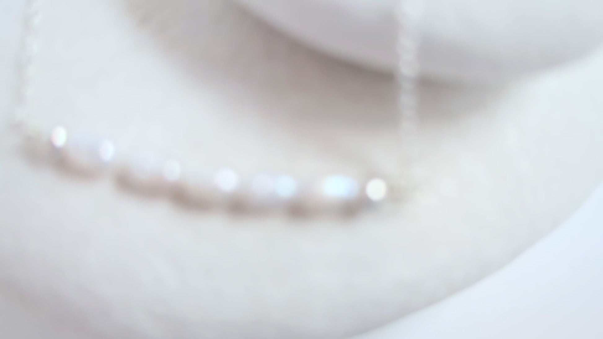 Dainty freshwater seed pearl bar necklace - shows close up of pearl bar and fine trace chain