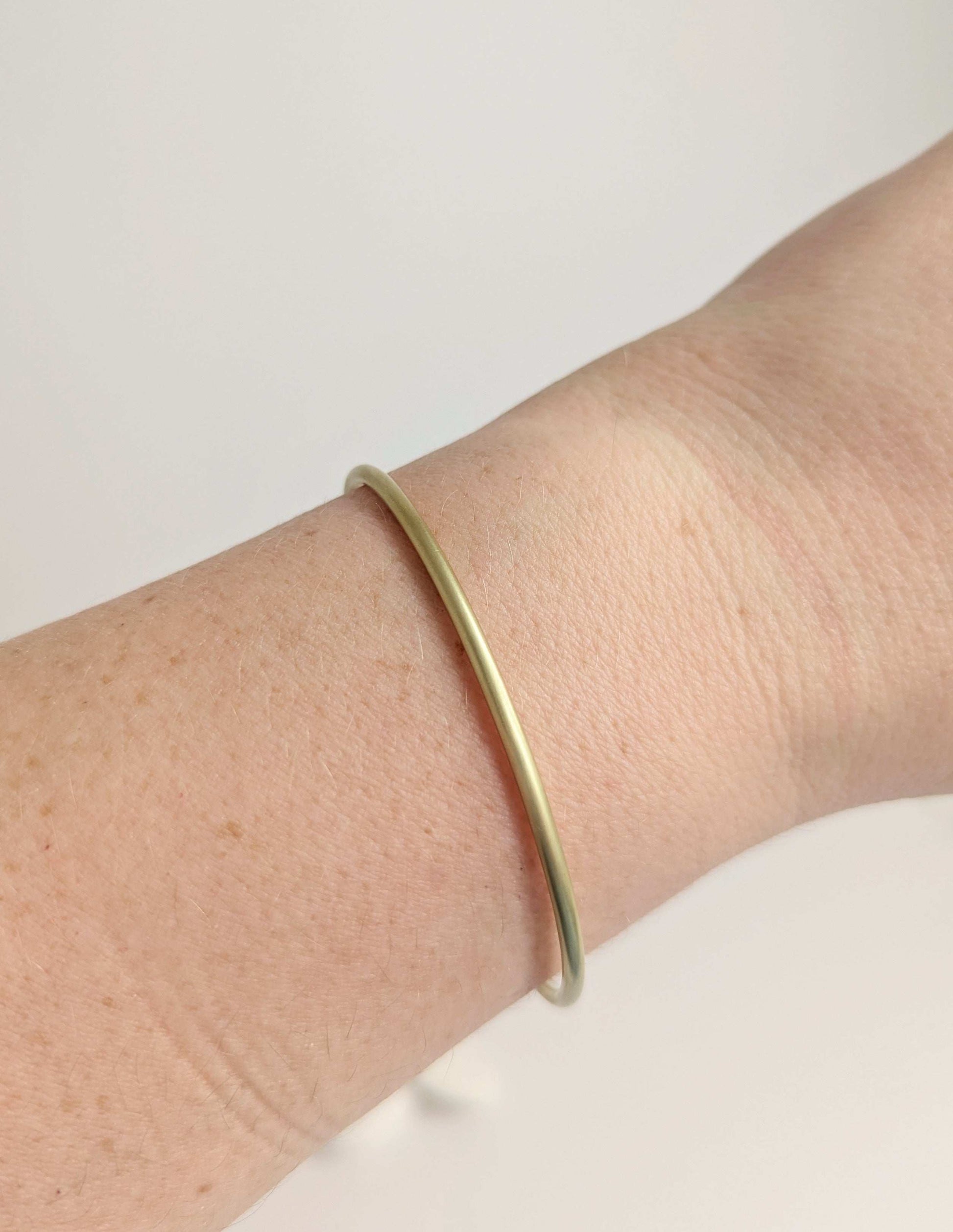 Slim brushed gold arm cuff bangle