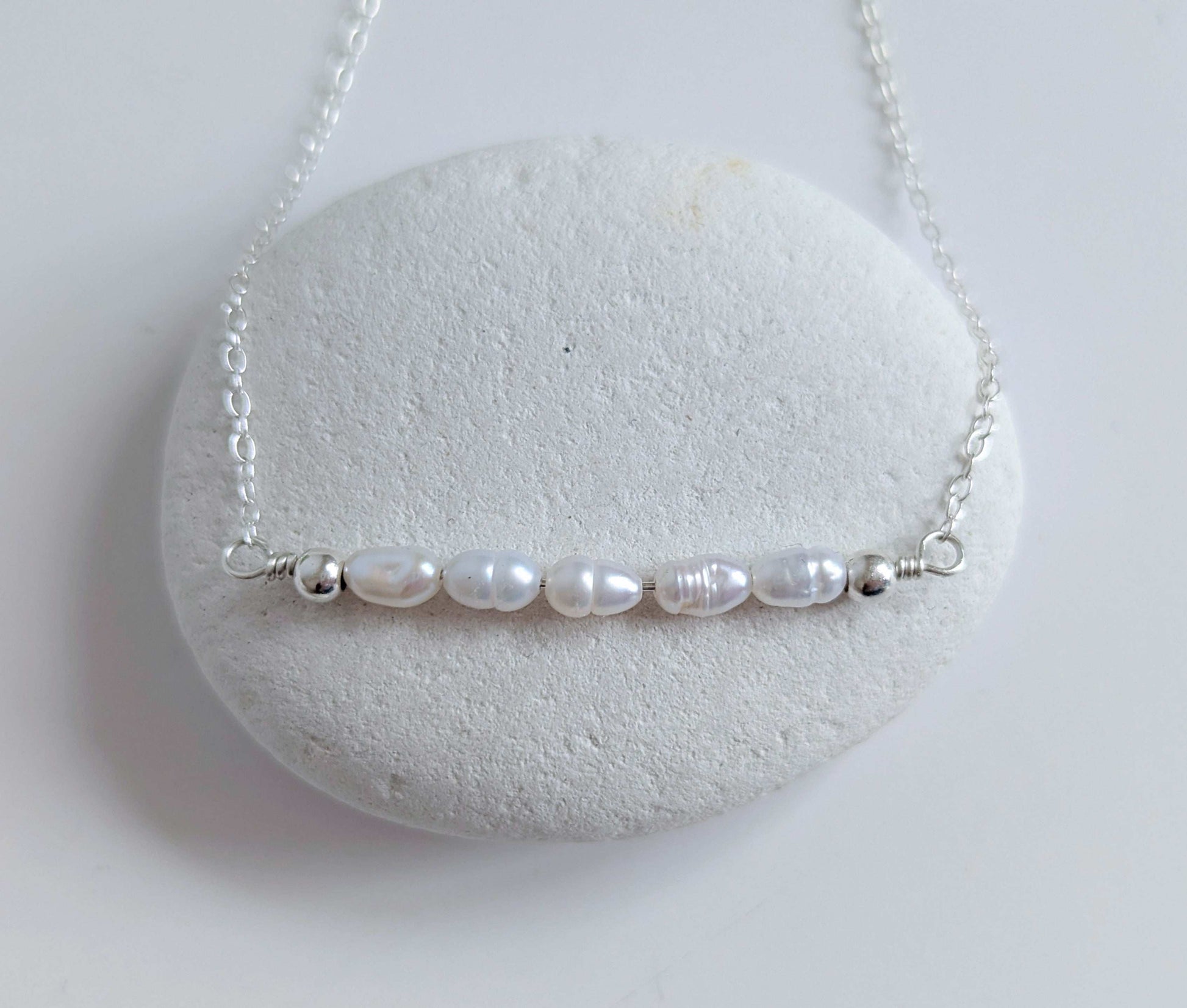 Dainty freshwater seed pearl bar necklace - close up of pearl bar