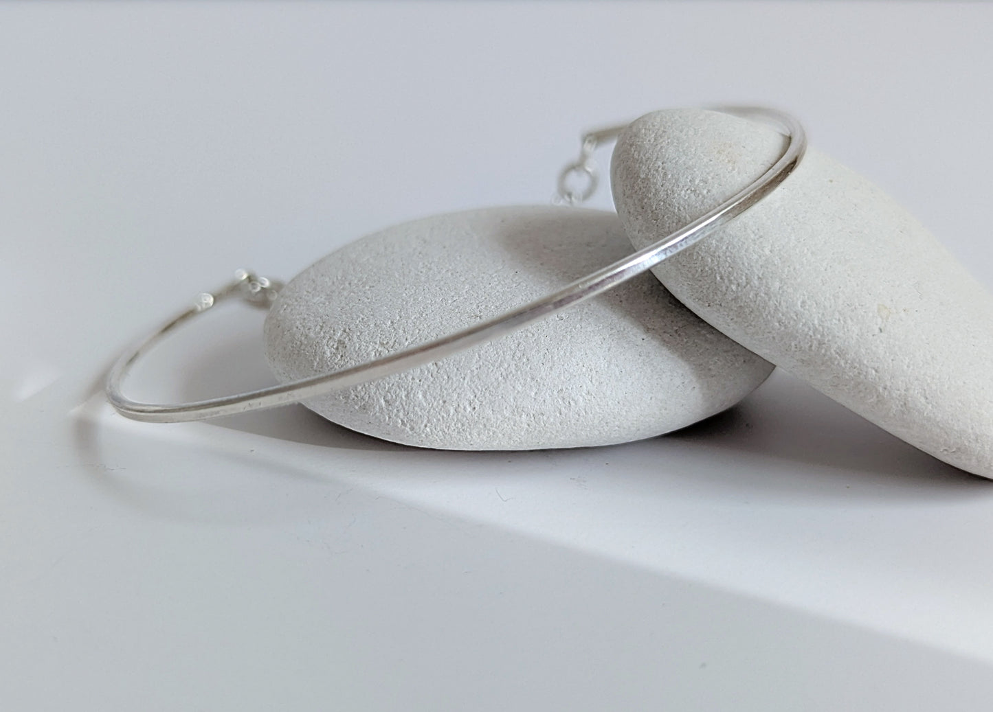 Thin sterling silver dainty cuff bangle with seed pearl bar chain - show front bangle