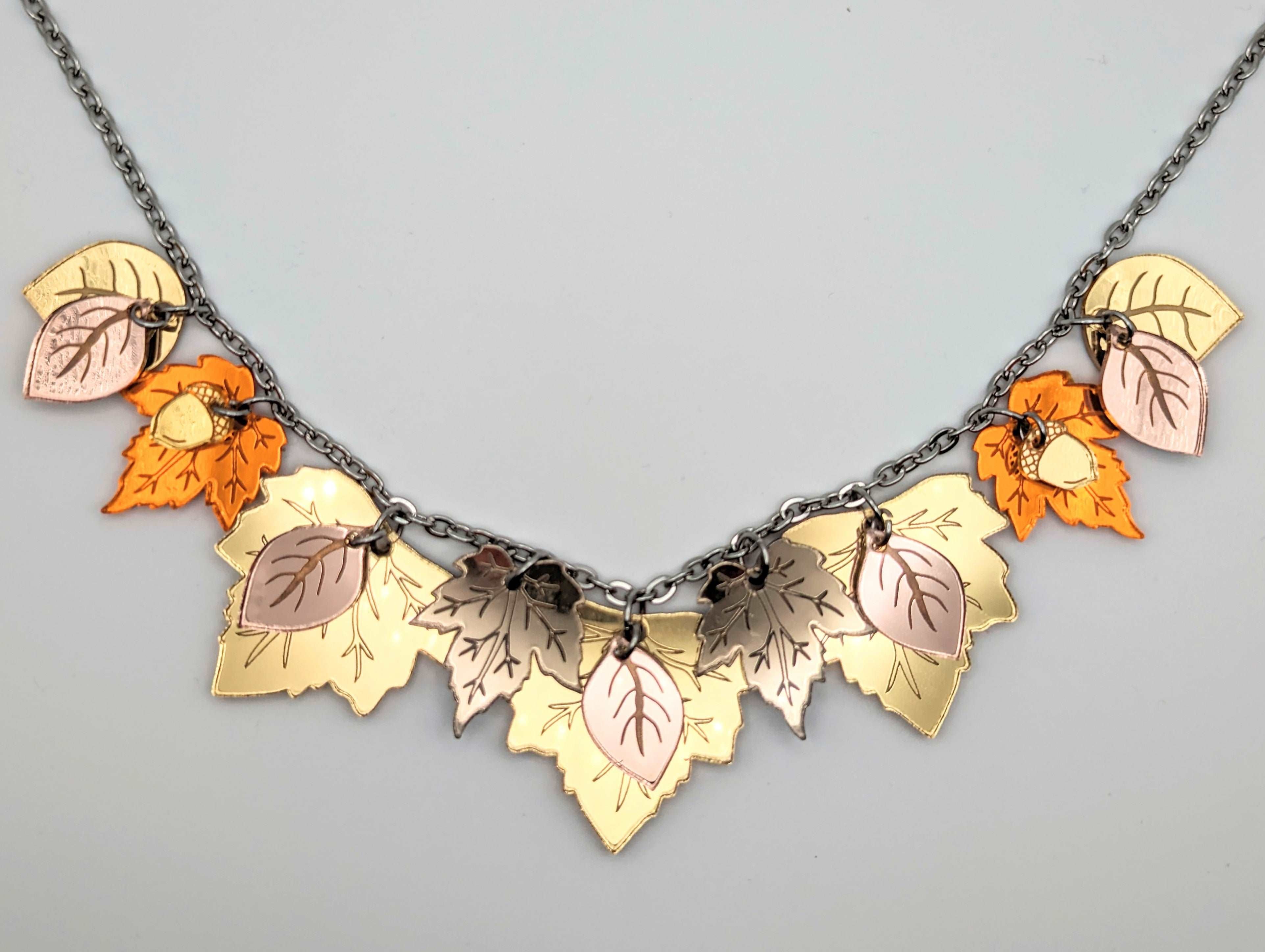 Laser cut filigree leather bib necklace, Gold necklace with nature-inspired  design - Teo Geo