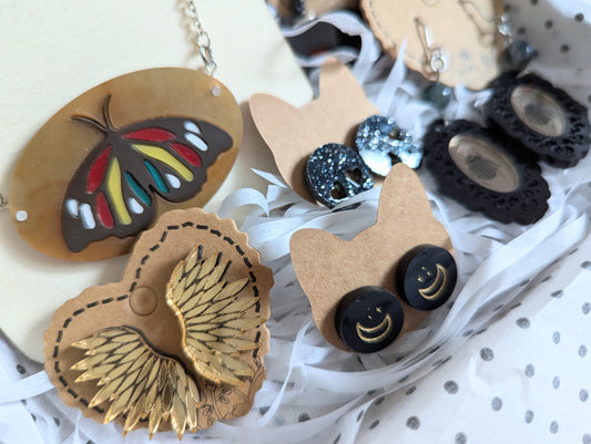 Alternative Moth & Wing themed acrylic jewellery gift box, This set includes; acrylic necklace, dangle earrings, studs and boot heel charm