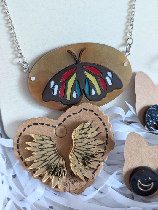 Alternative Moth & Wing themed acrylic jewellery gift box, This set includes; acrylic necklace, dangle earrings, studs and boot heel charm