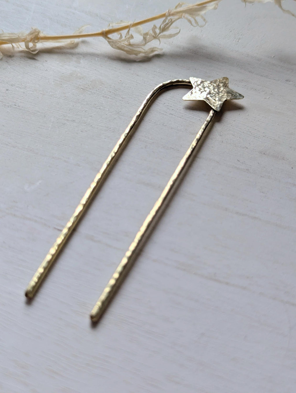 Handcrafted and forged hammered gold star rounded French pin bun hair fork - star offset to the right at the top of the hair fork