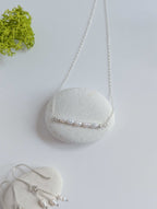 Dainty freshwater seed pearl bar necklace - laid flat