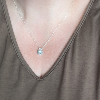 Star Necklace with a pendant worn by a person in a brown top