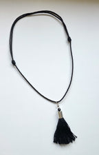 hand crafted sterling silver & black french jet tassel cord necklace white background