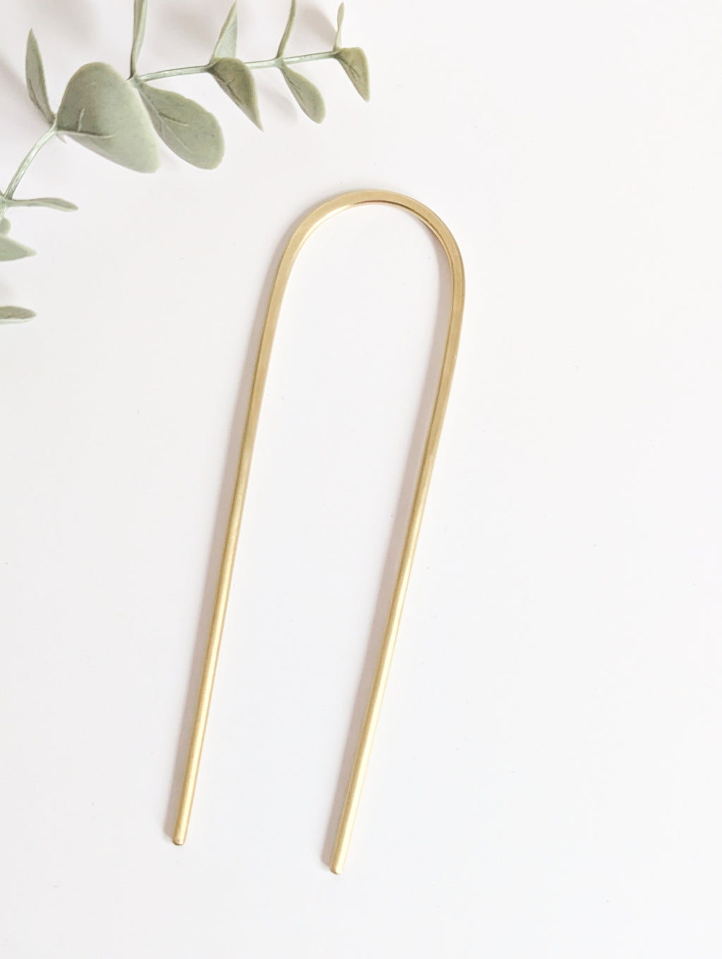 Brushed brass gold round pin hair fork
